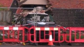 Car embedded in house, Norfolk