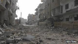 A view of buildings damaged by what activists said were missiles fired by a Syrian Air Force fighter jet loyal to Syria"s President Bashar al-Assad in Daria, near Damascus, 30 November 2012