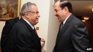 Jalal Talabani (L) and Nuri al-Maliki at a meeting on Monday