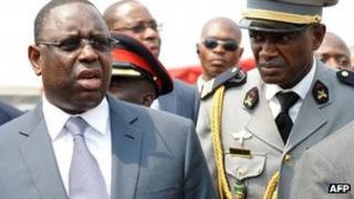 Senegalese President Macky Sall (L) arrives at the inauguration of Ghanaian President John Mahama on 7 January 2013