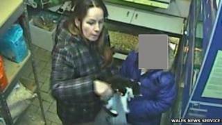Woman taking cat