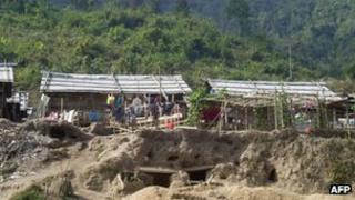 Bomb shelters built by Kachin refugees, at the Je Yang IDP camp, near Laiza, Burma, on 4 January 2013