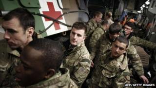 English soldiers inside a British Army Boeing C-17 cargo aircraft, arriving from the British Brize Norton base and en-route to Bamako