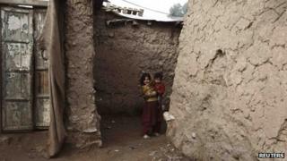 Children in slum on outskirts of Islamabad, Pakistan