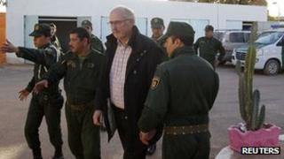 Algerian gendarmes escort former Norwegian hostage at In Amenas - 19 January