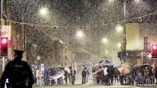 A flag protest was held in east Belfast during Monday night's snow