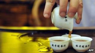 Hong Kong tea shop owner prepares Chinese tea the traditional way (2011 file picture)