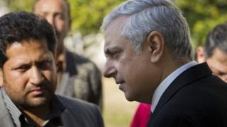 Irfan Qadir, right, attorney general of Pakistan speaks to reporters at the Supreme Court in Islamabad, Pakistan on Thursday, Jan. 24, 2013