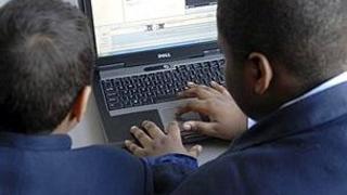 Children using a laptop