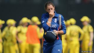 Sarah Taylor of England walks back after getting out during the super six match between England and Australia.