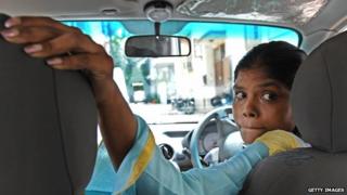 A driver trained by the Azad Foundation in Delhi
