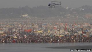 Helicopter flying low over Kumbh Mela on 10 February
