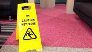 A wet floor sign