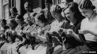 Women from South London knit socks for men fighting in WWII