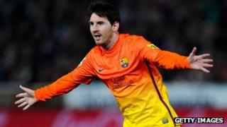 Lionel Messi of FC Barcelona celebrates after scoring his team's second goal during the La Liga match between Granada CF and FC Barcelona at Estadio Nuevo Los Carmenes, Granada, 16 February 2013