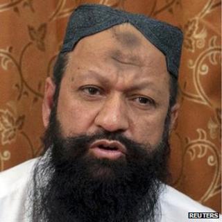Leader of the Lashkar-e-Jhangvi (LeJ) Malik Ishaq speaks during an interview in October 2012