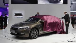 Qoros bosses unveil the new Qoros 3 sedan car