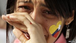 Venezuelan woman mourns