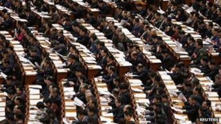 Delegates attend the third plenary session of the National People's Congress (NPC) at the Great Hall of the People in Beijing March 10, 2013.