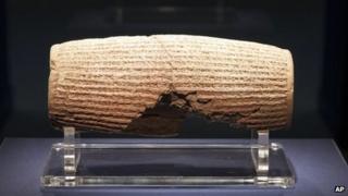 In this image provided by The Smithsonian Institution, the Cyrus Cylinder is seen on display at the Smithsonian's Freer Sackler Gallery in Washington