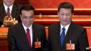 President Xi Jinping (R) and Premier Li Keqiang's appointment marks the end of top leadership change in China
