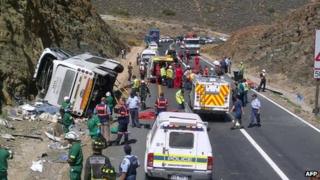 A photo taken on March 15, 2013 shows the wreckage of a double-decker bus carrying a church group that crashed in a mountainous pass near Cape Town, killing twenty-four people.