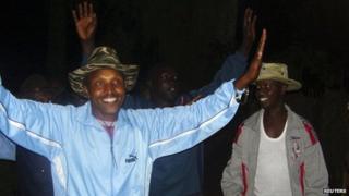 Fugitive Congolese warlord Bosco Ntaganda (L) dances alongside his commanders in Tebero, Masisi, on 18 November 2005