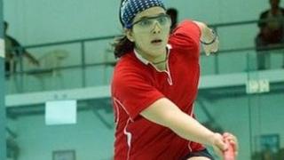 Maria playing squash