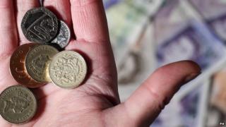 Coins in a hand