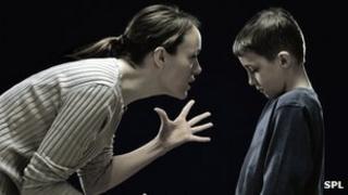 Mum telling off son