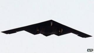 A US B-2 stealth bomber flies over a US air base in Pyeongtaek, south of Seoul, on March 28, 2013 as part of South Korea-US joint military exercise.