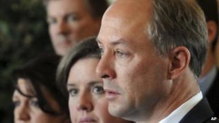 Mark Barden, right, father of Sandy Hook Elementary School shooting victim Daniel Barden, speaks alongside his wife, Jackie, and other Newtown parents, in Hartford, Connecticut 1 April 2013