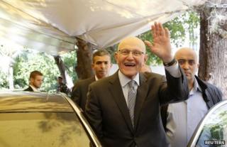 Tamam Salam waves to supporters in Beirut, 6 April