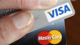 The European Commission is investigating inter-bank fees charged by MasterCard and Visa