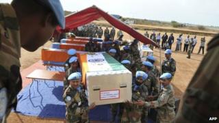 Coffins of Indian peacekeepers at a memorial service in Juba on April 10, 2013