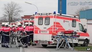 Ambulances outside plastics processing plant in Steinfeld (16 April)