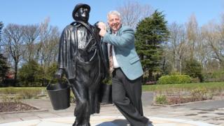 New statue of Charlie Caroli and his son Charlie junior