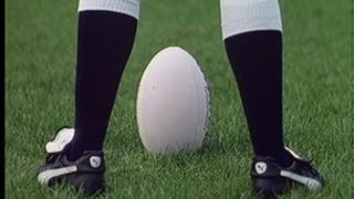 Generic shot of rugby player with ball