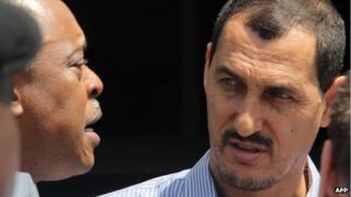 Azim Aghajani (R) outside the Federal High Court in Lagos on 30 April 2013