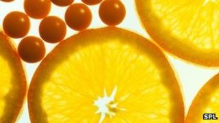 vitamin C tablets and orange slices
