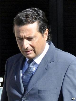 Capt Schettino leaving home for court, 14 May 2013