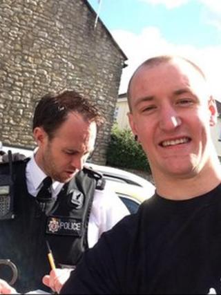 Cyclist Tim Burton and PC Keith James
