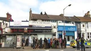 People outside London Road property
