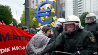 Protesters and police face-off outside the European Central Bank (ECB) in Frankfurt am Main, central Germany on May 31, 2013