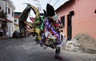A lone dancer in the streets of Naiguata on 30 May 2013