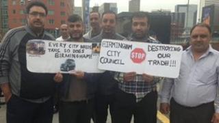 Protesting taxi cab drivers