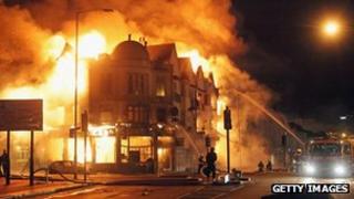 A large fire breaks out in shops and residential properties in Croydon in the 2011 riots