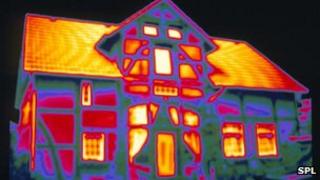 Thermal image of house showing heat loss