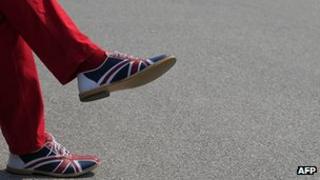 Man wearing shoes with Union Jack motif in Vienna