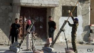Opposition groups preparing to launch mortar rounds on the outskirts of Damascus